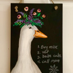 B40  Margaret the Goose on chalkboard sign